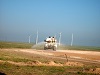water truck spraying for windmill farm pad