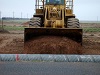 bull dozer covering up culvert