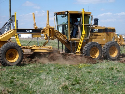 using a motor grader for dirt work