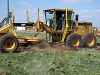 using a motor grader for dirt work